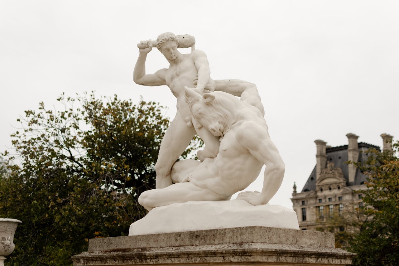 statue of a greek hero battling a centaur